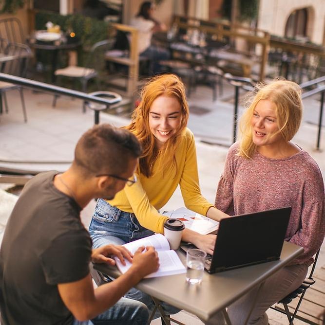 Students at an outdoor café.