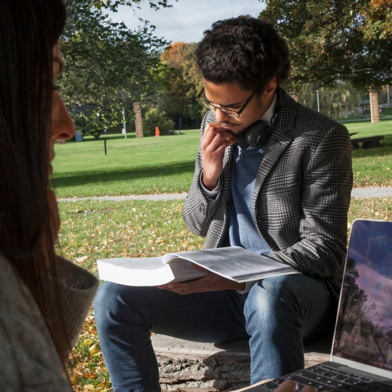 Students studying outdoors on the Frescati campus.