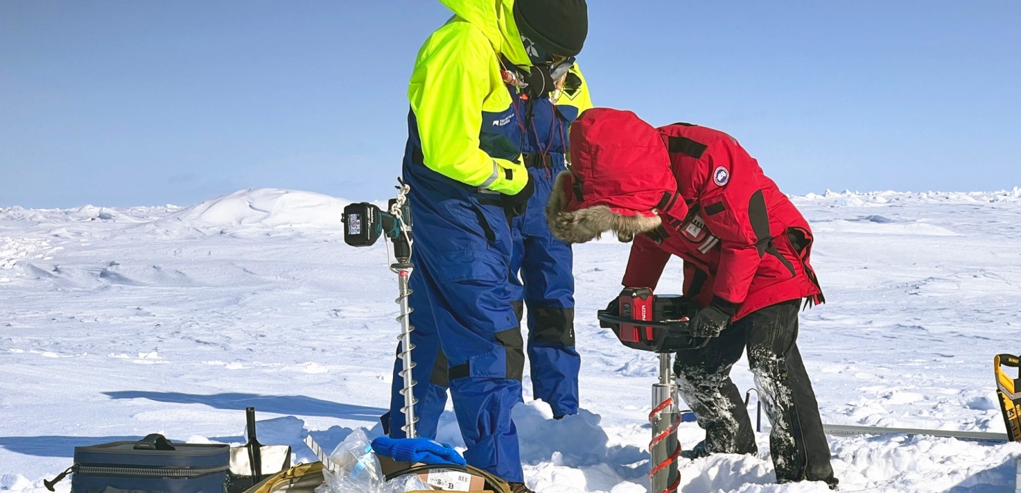 Scientists sampling sea water, snow, and ice