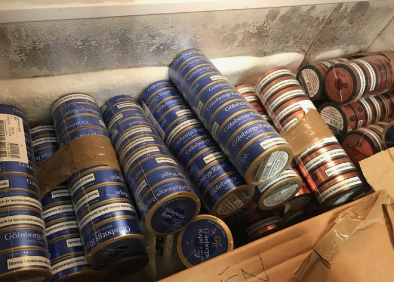 Snus packages (moist powder smokeless tobacco product) in the freezer