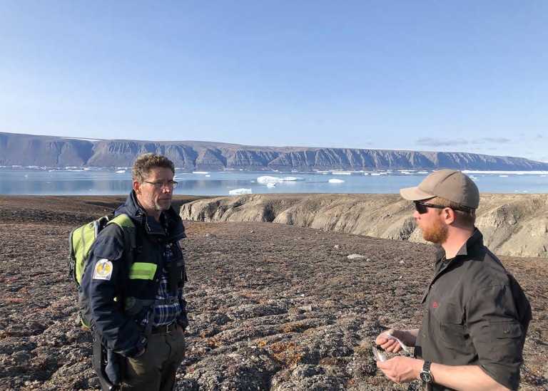 2 researchers talking, greenland, ryder glacier