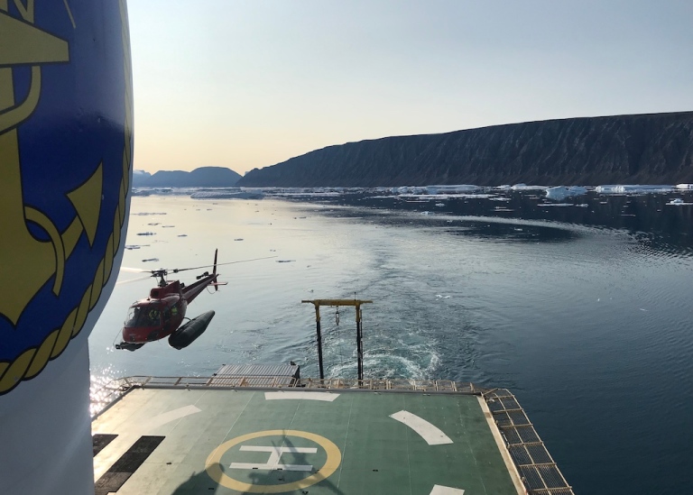 Helicopter lending on deck, icebreaker oden
