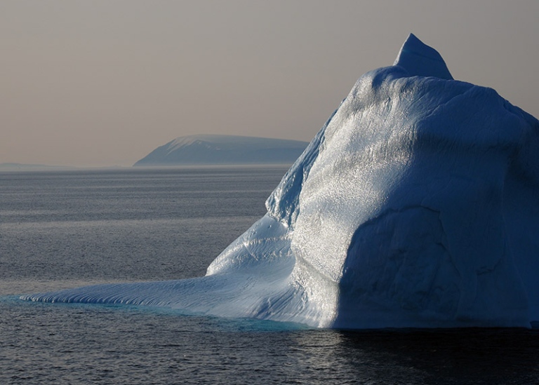 Iceberg outside Northern Greenland, in evening light