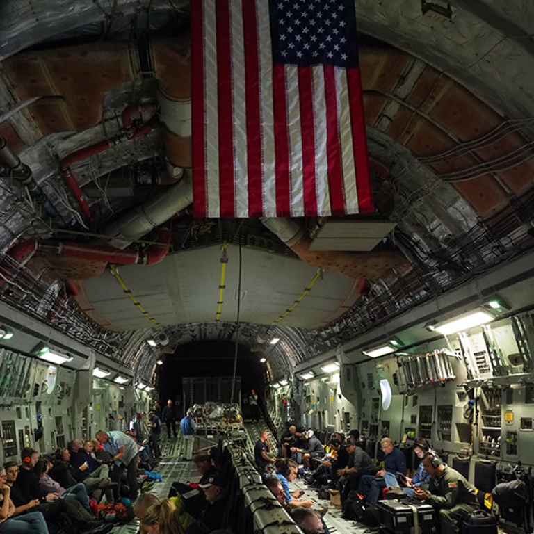 Inside US Airforce C17, people sitting in their seats
