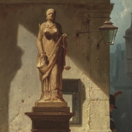Konstverk med fru justitia som staty