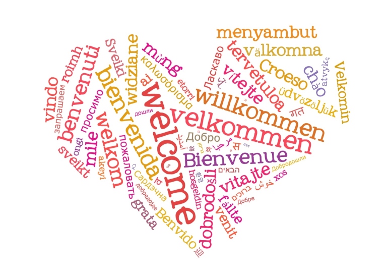 Hjärta uppbyggt av ord för "välkommen" på olika språk
