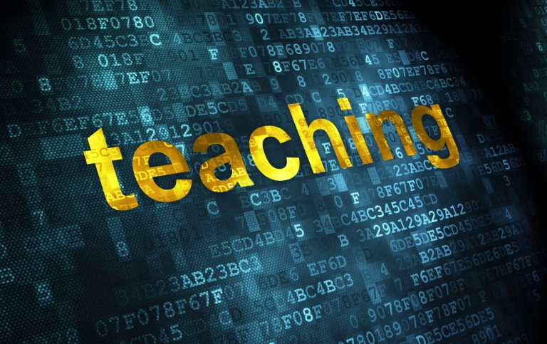 Bild med ordet teaching på digital skärm.