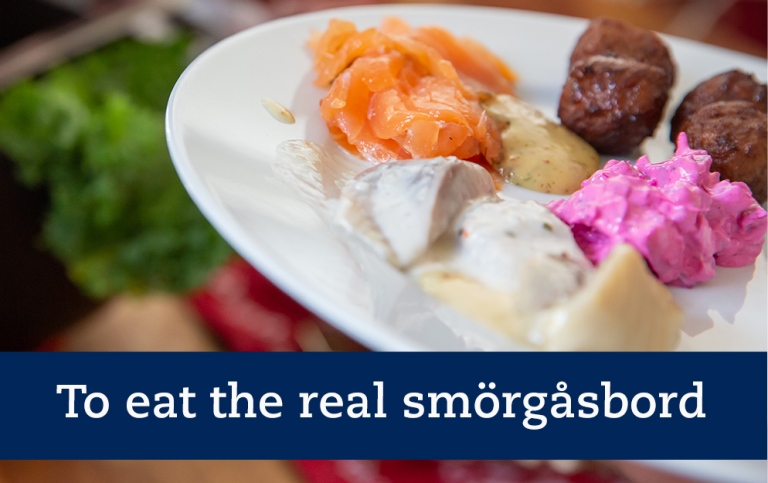 To eat the real smörgåsbord. Plate with spicy salmon, herring, meatballs, potatoe, beetroot sallad