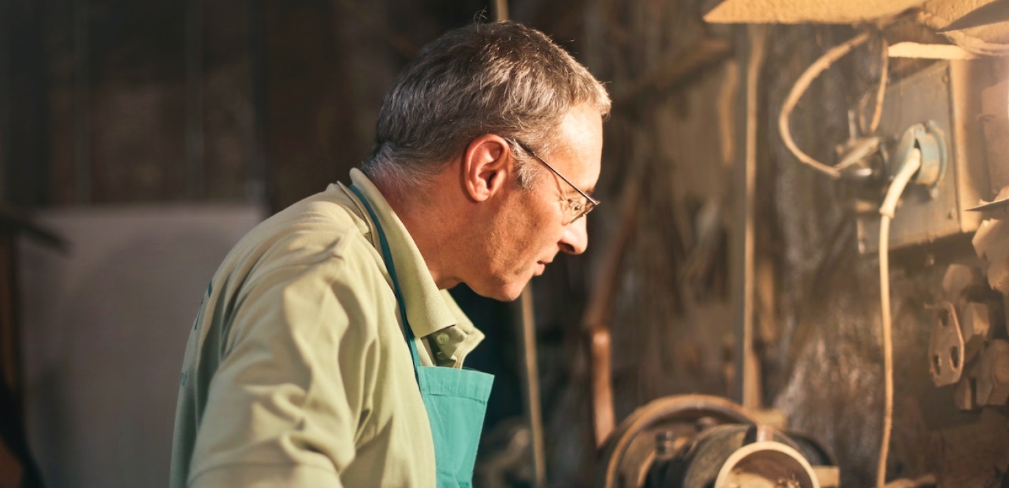 A man at a lathe in the workshop. Photo: Andrea Piacquadio from Pexels