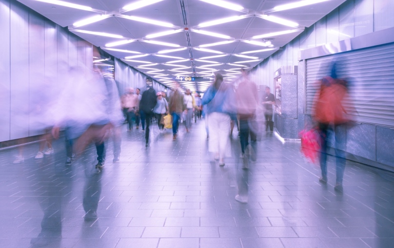 Genre photo: Blurred photo of people in movement.