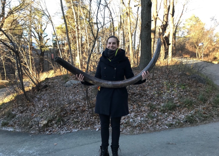 Marianne Dehasque with a mammoth tusk